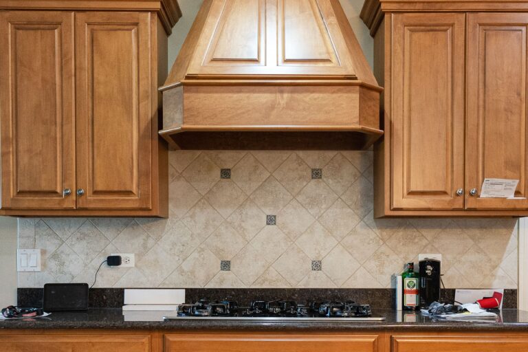 kitchen counter with old backsplash tiles
