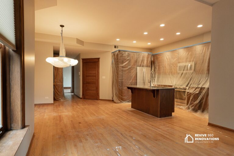 kitchen room with protective sheets before renovation