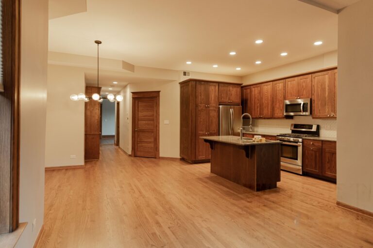 kitchen with hardwood floor and cabinets