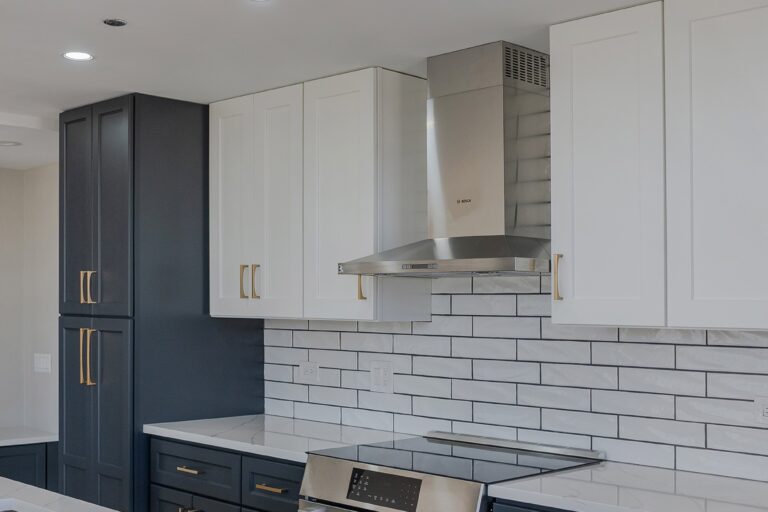 refaced kitchen cabinets with white tile backsplash