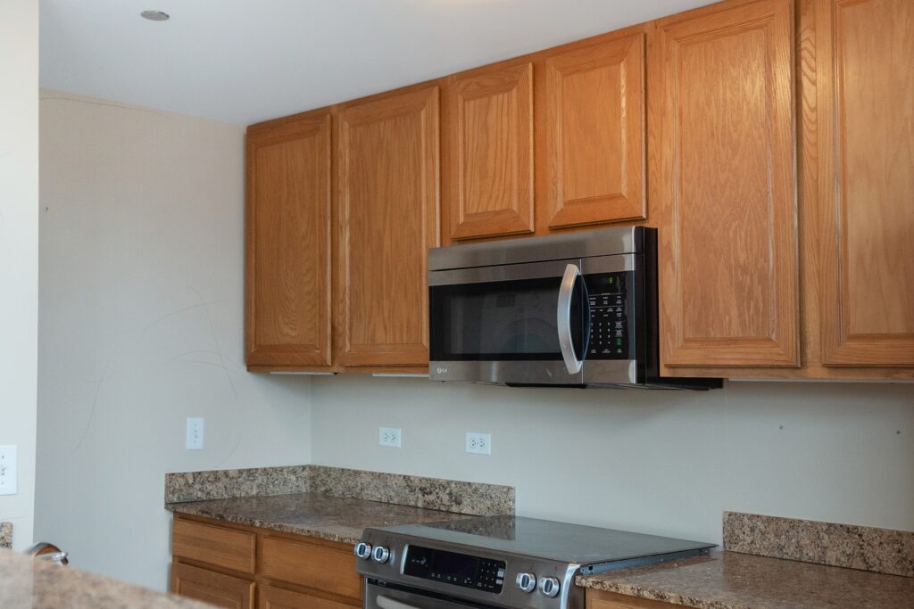 kitchen with old wood cabinets and countertop