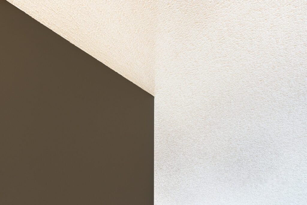 Smooth finished ceiling after popcorn texture removal in a Chicago home