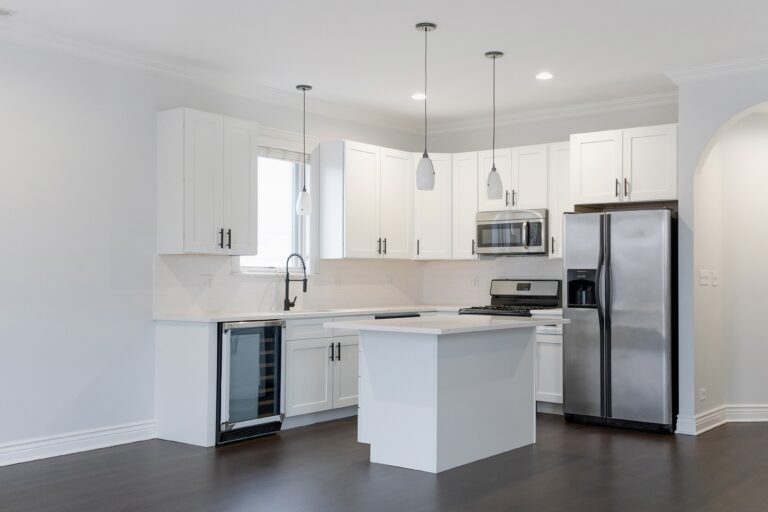 new white kitchen and hardwood floor