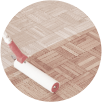 pplying lacquer finish on hardwood floor