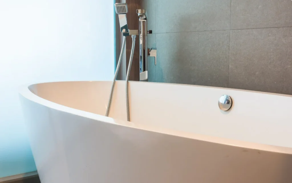 Modern freestanding bathtub in a renovated bathroom