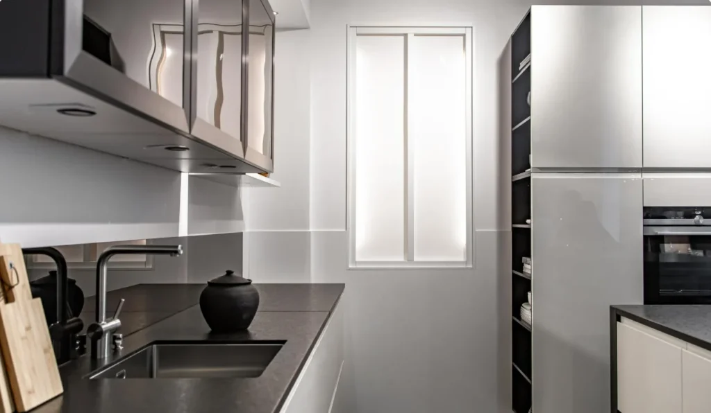 Modern kitchen with black countertops and custom cabinets